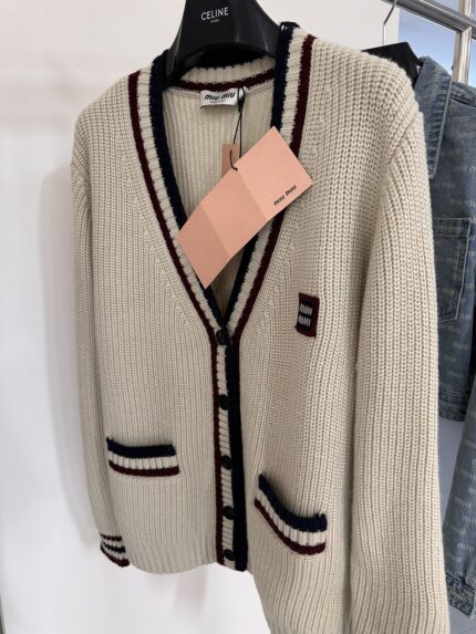 MiuMiu Apricot Cardigan with Red Trim and V-neck